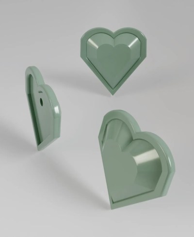 3D render of a pastel green stud earring, featuring a faceted, geometric heart shape, shown from multiple angles.