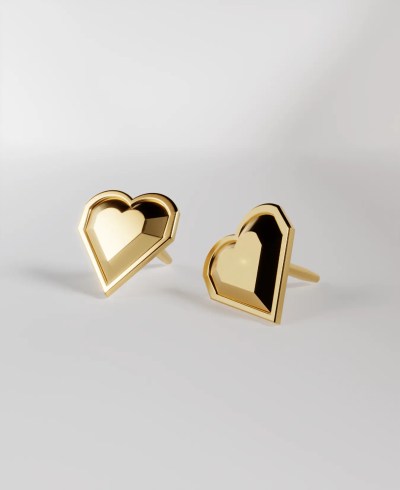 Pair of 18k yellow gold stud earrings, featuring a faceted, geometric heart shape.