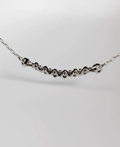 18k white gold necklace, featuring a central section with an intricate, interwoven or braided chain design on a delicate cable chain.