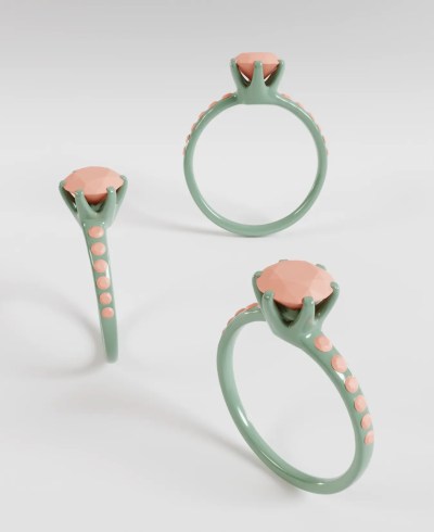 3D render of a solitaire ring in pastel green, featuring a round peach colored gemstone held by 6 prongs, with small round peach accents flush set along the band, shown from multiple angles.